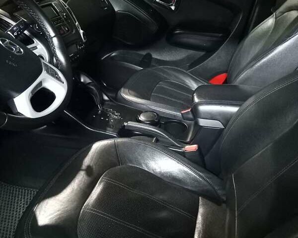 Чорний Хендай іх35, об'ємом двигуна 2 л та пробігом 157 тис. км за 12000 $, фото 14 на Automoto.ua