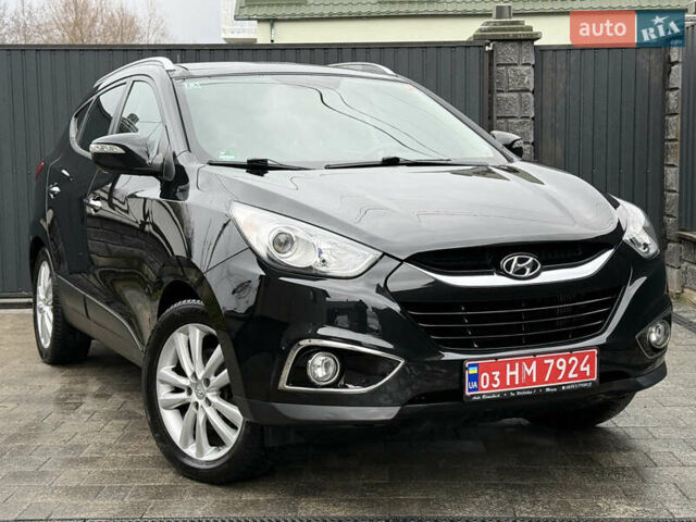 Чорний Хендай іх35, об'ємом двигуна 2 л та пробігом 206 тис. км за 13099 $, фото 9 на Automoto.ua