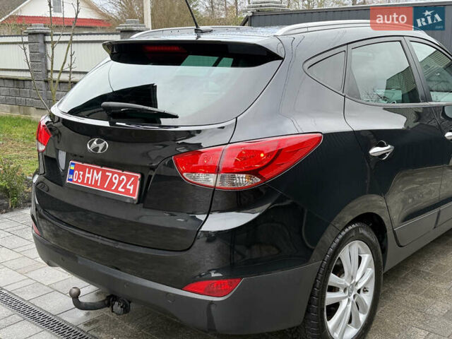 Чорний Хендай іх35, об'ємом двигуна 2 л та пробігом 206 тис. км за 13099 $, фото 36 на Automoto.ua
