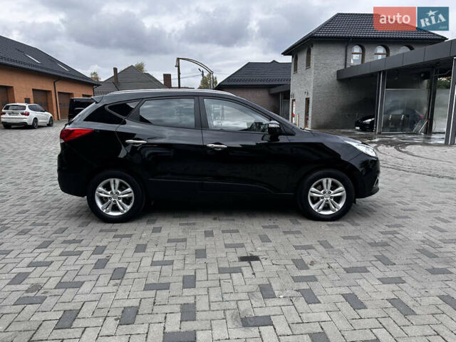 Черный Хендай их35, объемом двигателя 2 л и пробегом 197 тыс. км за 13650 $, фото 28 на Automoto.ua