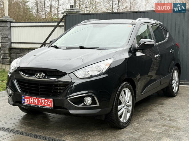 Чорний Хендай іх35, об'ємом двигуна 2 л та пробігом 206 тис. км за 13099 $, фото 13 на Automoto.ua