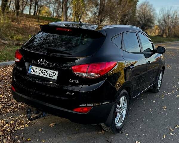 Черный Хендай их35, объемом двигателя 2 л и пробегом 104 тыс. км за 11600 $, фото 8 на Automoto.ua