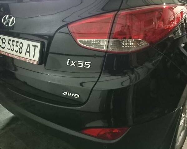 Чорний Хендай іх35, об'ємом двигуна 2 л та пробігом 157 тис. км за 12000 $, фото 4 на Automoto.ua