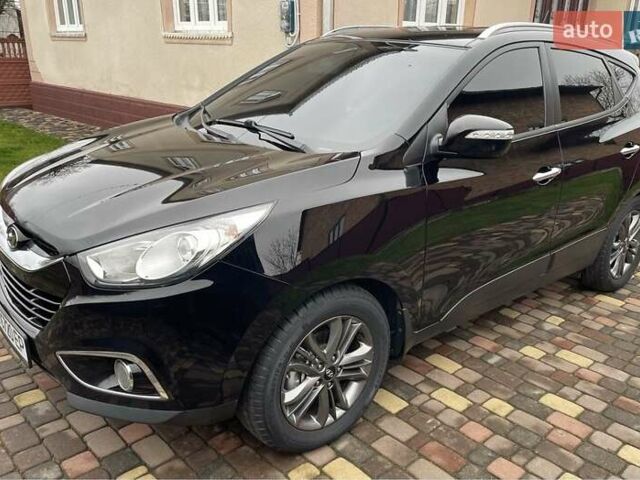 Чорний Хендай іх35, об'ємом двигуна 2 л та пробігом 210 тис. км за 12700 $, фото 1 на Automoto.ua
