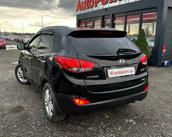 Черный Хендай их35, объемом двигателя 2 л и пробегом 157 тыс. км за 12700 $, фото 8 на Automoto.ua