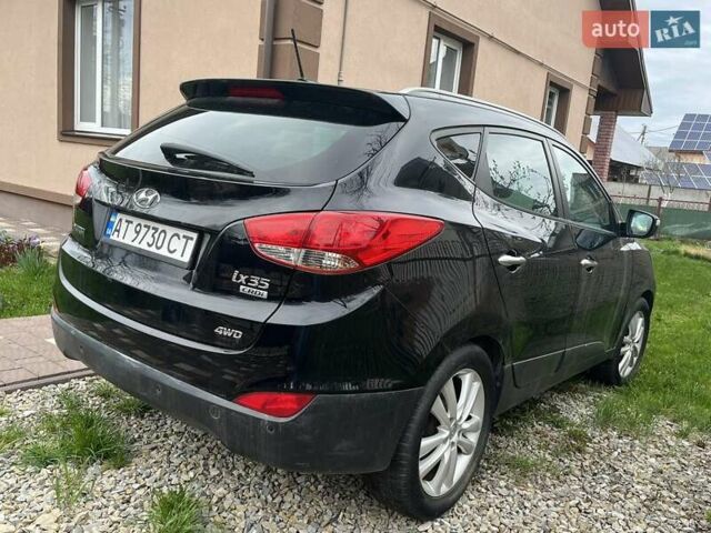 Чорний Хендай іх35, об'ємом двигуна 2 л та пробігом 181 тис. км за 12200 $, фото 7 на Automoto.ua