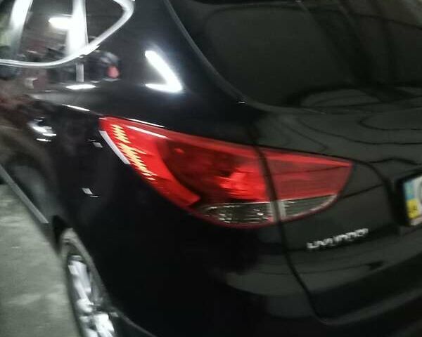 Чорний Хендай іх35, об'ємом двигуна 2 л та пробігом 157 тис. км за 12000 $, фото 17 на Automoto.ua