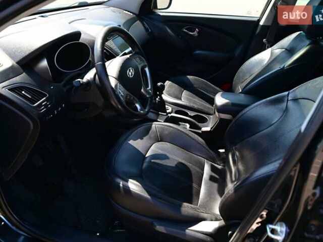 Чорний Хендай іх35, об'ємом двигуна 2 л та пробігом 226 тис. км за 10990 $, фото 19 на Automoto.ua