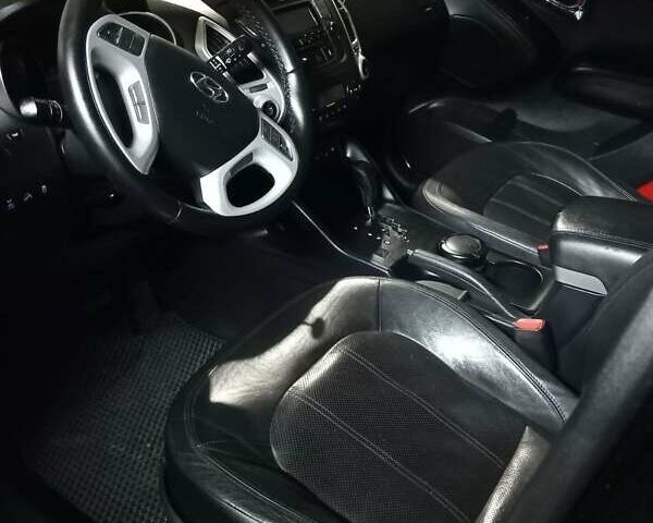 Чорний Хендай іх35, об'ємом двигуна 2 л та пробігом 157 тис. км за 12000 $, фото 13 на Automoto.ua