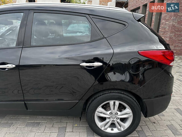 Черный Хендай их35, объемом двигателя 2 л и пробегом 197 тыс. км за 13650 $, фото 13 на Automoto.ua