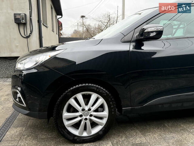 Чорний Хендай іх35, об'ємом двигуна 2 л та пробігом 206 тис. км за 13099 $, фото 17 на Automoto.ua