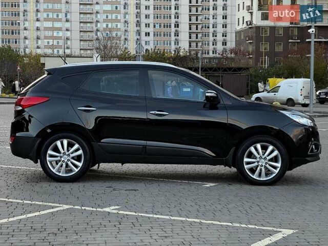 Черный Хендай их35, объемом двигателя 2 л и пробегом 103 тыс. км за 13400 $, фото 8 на Automoto.ua