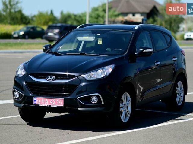 Чорний Хендай іх35, об'ємом двигуна 2 л та пробігом 226 тис. км за 10990 $, фото 11 на Automoto.ua