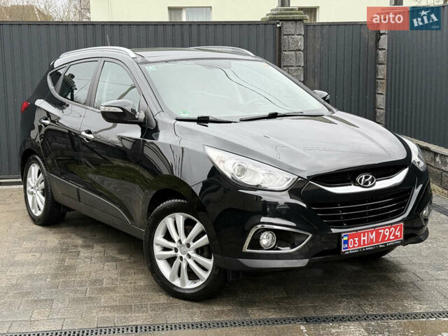 Чорний Хендай іх35, об'ємом двигуна 2 л та пробігом 206 тис. км за 13099 $, фото 3 на Automoto.ua