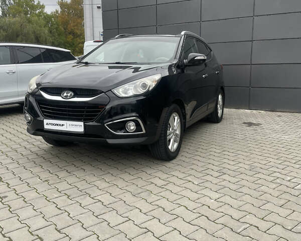 Черный Хендай их35, объемом двигателя 2 л и пробегом 179 тыс. км за 12000 $, фото 6 на Automoto.ua