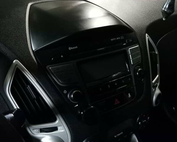 Чорний Хендай іх35, об'ємом двигуна 2 л та пробігом 157 тис. км за 12000 $, фото 9 на Automoto.ua