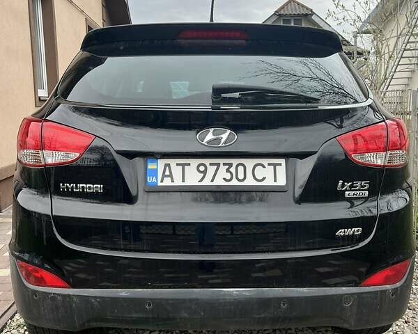 Чорний Хендай іх35, об'ємом двигуна 2 л та пробігом 181 тис. км за 12200 $, фото 6 на Automoto.ua