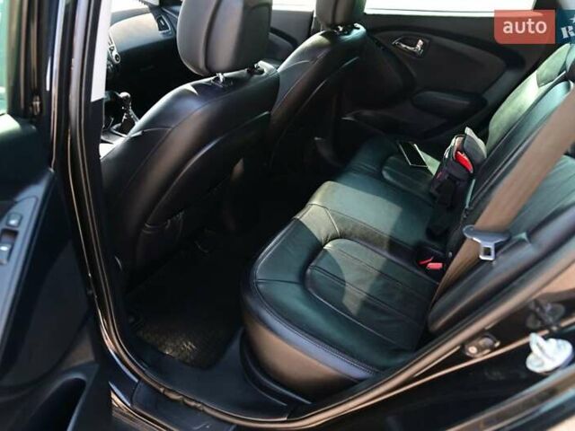 Чорний Хендай іх35, об'ємом двигуна 2 л та пробігом 226 тис. км за 10990 $, фото 15 на Automoto.ua