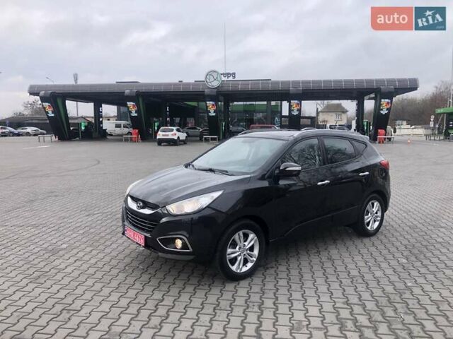 Черный Хендай их35, объемом двигателя 2 л и пробегом 184 тыс. км за 13500 $, фото 5 на Automoto.ua