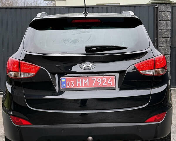 Чорний Хендай іх35, об'ємом двигуна 2 л та пробігом 206 тис. км за 13099 $, фото 31 на Automoto.ua