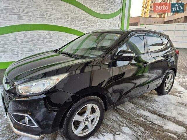 Черный Хендай их35, объемом двигателя 2 л и пробегом 221 тыс. км за 12000 $, фото 1 на Automoto.ua