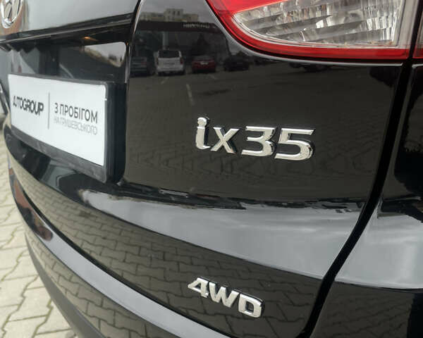 Черный Хендай их35, объемом двигателя 2 л и пробегом 179 тыс. км за 12000 $, фото 28 на Automoto.ua