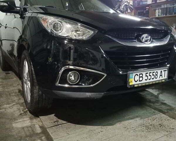 Чорний Хендай іх35, об'ємом двигуна 2 л та пробігом 157 тис. км за 12000 $, фото 1 на Automoto.ua