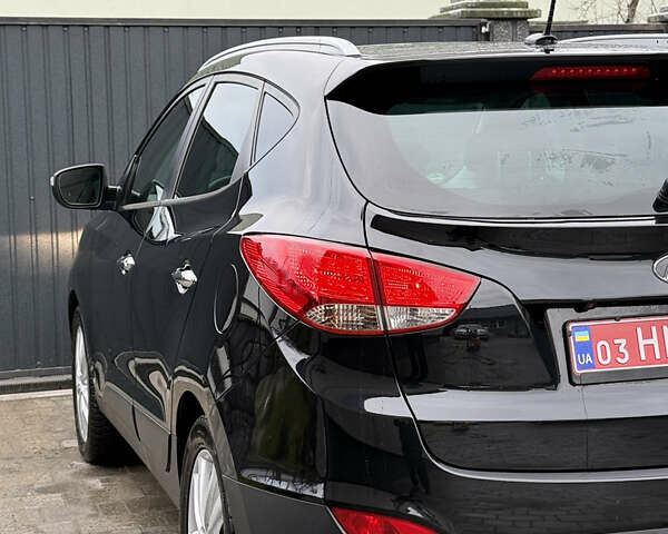 Чорний Хендай іх35, об'ємом двигуна 2 л та пробігом 206 тис. км за 13099 $, фото 32 на Automoto.ua