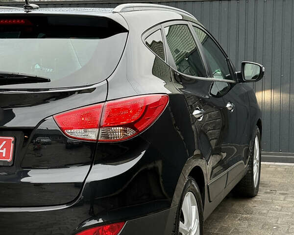 Чорний Хендай іх35, об'ємом двигуна 2 л та пробігом 206 тис. км за 13099 $, фото 33 на Automoto.ua