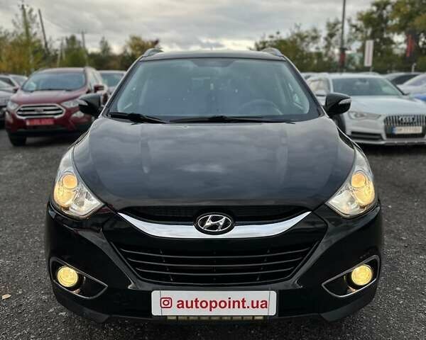 Черный Хендай их35, объемом двигателя 2 л и пробегом 157 тыс. км за 12700 $, фото 1 на Automoto.ua