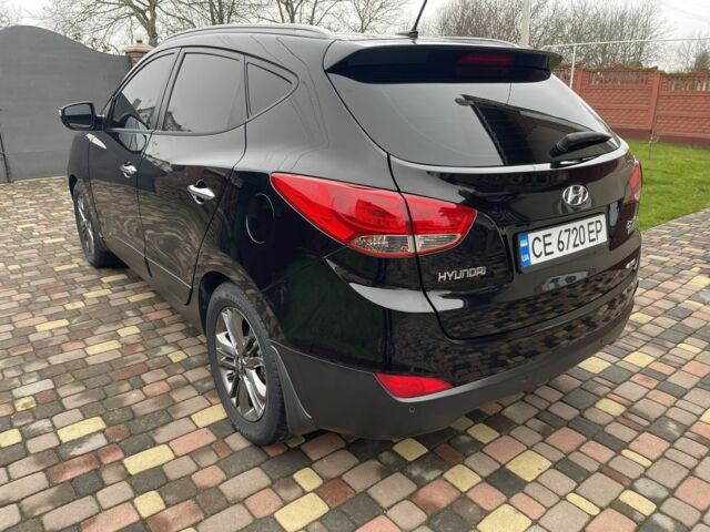 Чорний Хендай іх35, об'ємом двигуна 2 л та пробігом 210 тис. км за 12700 $, фото 4 на Automoto.ua