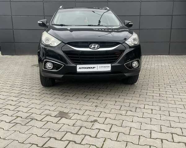 Черный Хендай их35, объемом двигателя 2 л и пробегом 179 тыс. км за 12000 $, фото 3 на Automoto.ua