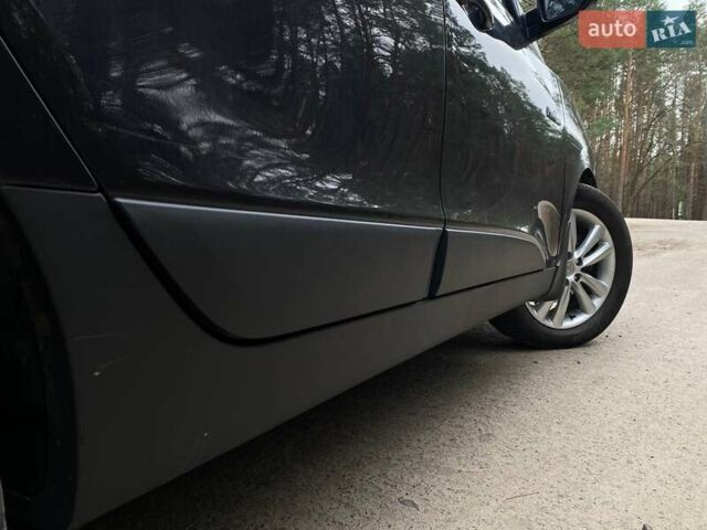 Черный Хендай их35, объемом двигателя 1.69 л и пробегом 290 тыс. км за 10999 $, фото 12 на Automoto.ua