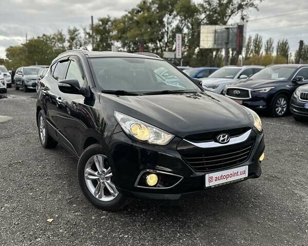 Черный Хендай их35, объемом двигателя 2 л и пробегом 157 тыс. км за 12700 $, фото 2 на Automoto.ua