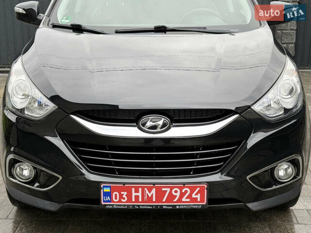 Чорний Хендай іх35, об'ємом двигуна 2 л та пробігом 206 тис. км за 13099 $, фото 18 на Automoto.ua
