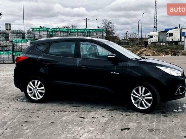 Черный Хендай их35, объемом двигателя 1.69 л и пробегом 290 тыс. км за 10999 $, фото 3 на Automoto.ua