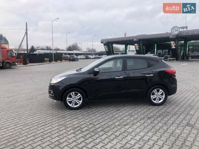 Черный Хендай их35, объемом двигателя 2 л и пробегом 184 тыс. км за 13500 $, фото 6 на Automoto.ua