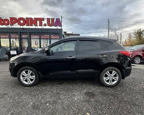 Черный Хендай их35, объемом двигателя 2 л и пробегом 157 тыс. км за 12700 $, фото 4 на Automoto.ua