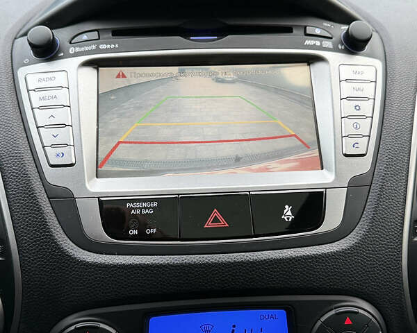 Чорний Хендай іх35, об'ємом двигуна 2 л та пробігом 206 тис. км за 13099 $, фото 44 на Automoto.ua