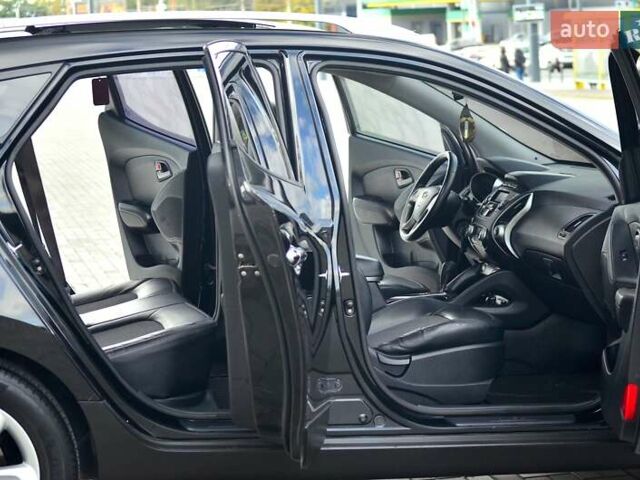 Чорний Хендай іх35, об'ємом двигуна 2 л та пробігом 141 тис. км за 13200 $, фото 11 на Automoto.ua