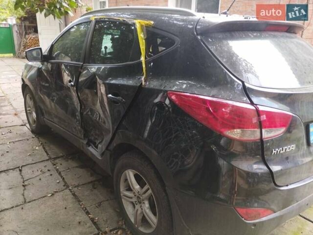 Чорний Хендай іх35, об'ємом двигуна 1.7 л та пробігом 200 тис. км за 4800 $, фото 5 на Automoto.ua