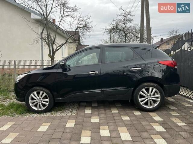 Чорний Хендай іх35, об'ємом двигуна 2 л та пробігом 181 тис. км за 12200 $, фото 1 на Automoto.ua