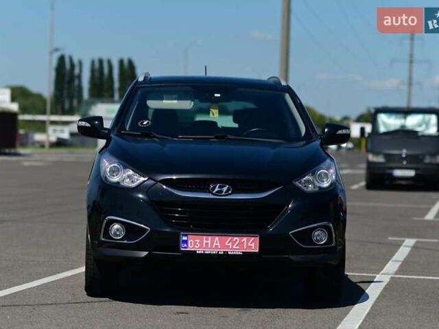 Чорний Хендай іх35, об'ємом двигуна 2 л та пробігом 226 тис. км за 10990 $, фото 4 на Automoto.ua