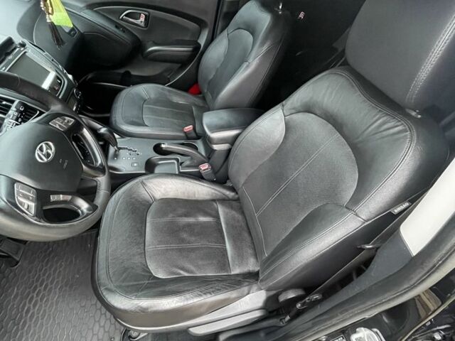 Чорний Хендай іх35, об'ємом двигуна 2 л та пробігом 210 тис. км за 12700 $, фото 5 на Automoto.ua