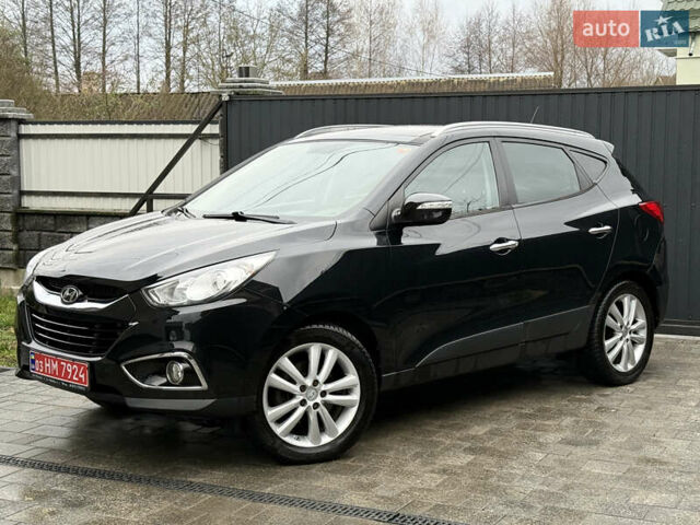 Чорний Хендай іх35, об'ємом двигуна 2 л та пробігом 206 тис. км за 13099 $, фото 27 на Automoto.ua