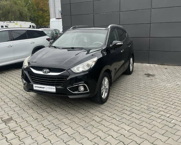 Черный Хендай их35, объемом двигателя 2 л и пробегом 179 тыс. км за 12000 $, фото 7 на Automoto.ua