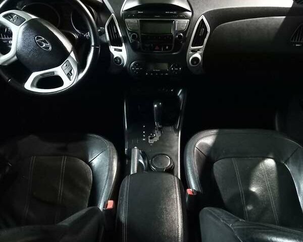 Чорний Хендай іх35, об'ємом двигуна 2 л та пробігом 157 тис. км за 12000 $, фото 7 на Automoto.ua