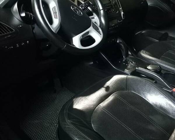 Чорний Хендай іх35, об'ємом двигуна 2 л та пробігом 157 тис. км за 12000 $, фото 15 на Automoto.ua