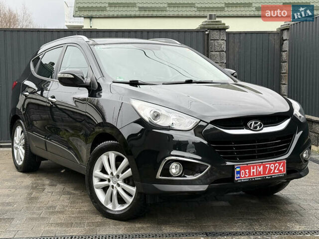 Чорний Хендай іх35, об'ємом двигуна 2 л та пробігом 206 тис. км за 13099 $, фото 8 на Automoto.ua