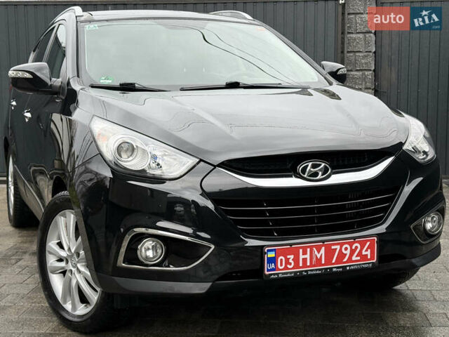 Чорний Хендай іх35, об'ємом двигуна 2 л та пробігом 206 тис. км за 13099 $, фото 7 на Automoto.ua